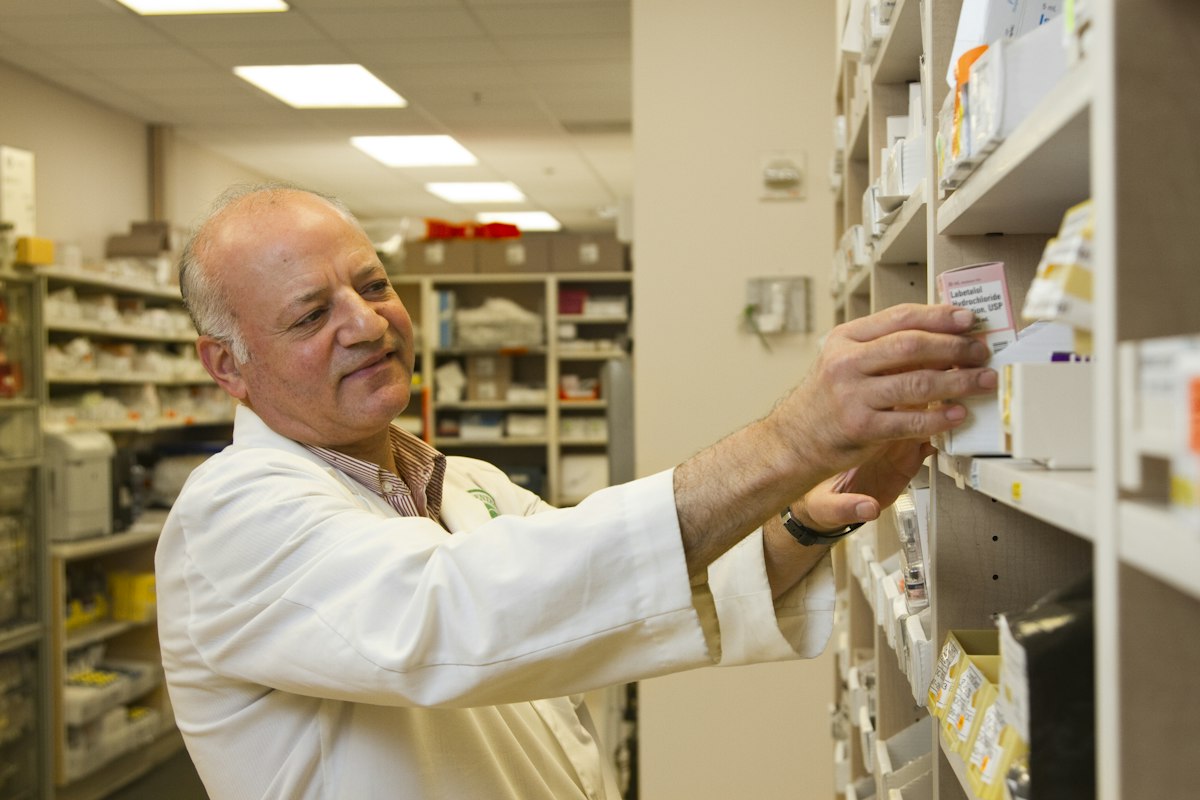 Pharmacist at the shelves