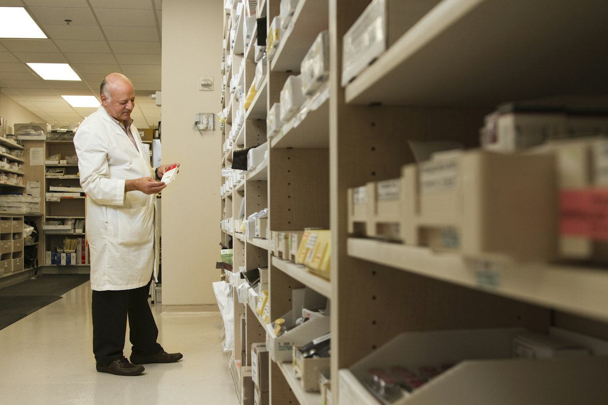 Pharmacist at the shelves