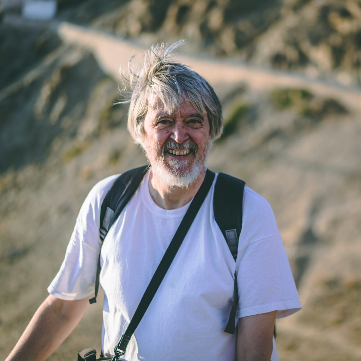 Cheerful senior man enjoying the outdoors